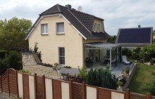 Ansicht Modernes Haus mit Wintergarten und gro�er Terrasse sucht Sie